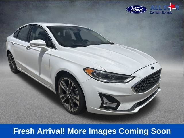 2019 Ford Fusion Titanium in Copper Metallic — front three-quarter view